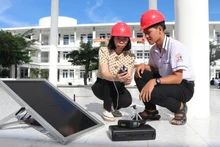 Industrial electronics lecturers train students at Dang Chi Thanh Secondary and High School on renewable energy, sponsored by the German Development Agency (GIZ).