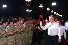 General Secretary To Lam attends the political and artistic programme entitled "Under the Glorious Flag" at the Ba Dinh Square (Ha Noi). (Photo: VNA)