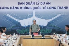 Prime Minister Pham Minh Chinh speaks at the working session with with Long Thanh airport's construction units in Dong Nai province on August 2. (Photo: VNA)