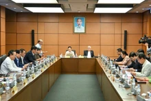National Assembly deputies discuss in groups the draft Law on Cyber Security. (Photo: THUY NGUYEN)