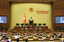An overview of the plenary session at the 10th Session of the 15th National Assembly. (Photo: DUY LINH)