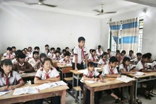Students in Ninh Phuoc commune, Khanh Hoa province return to school after the flood. (Photo: NGUYEN TRUNG)