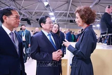 Prime Minister Pham Minh Chinh (centre) meets with UNESCO Director-General Audrey Azoulay on June 9. (Photo: VNA)