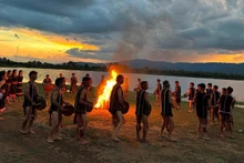 The Gia Rai people perform gongs by a campfire in the Central Highlands. (Photo: PHONG DIEP)