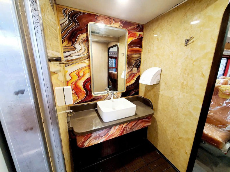 The ceiling features a stepped design with a delicately decorated floral fabric and an LED strip lighting system.