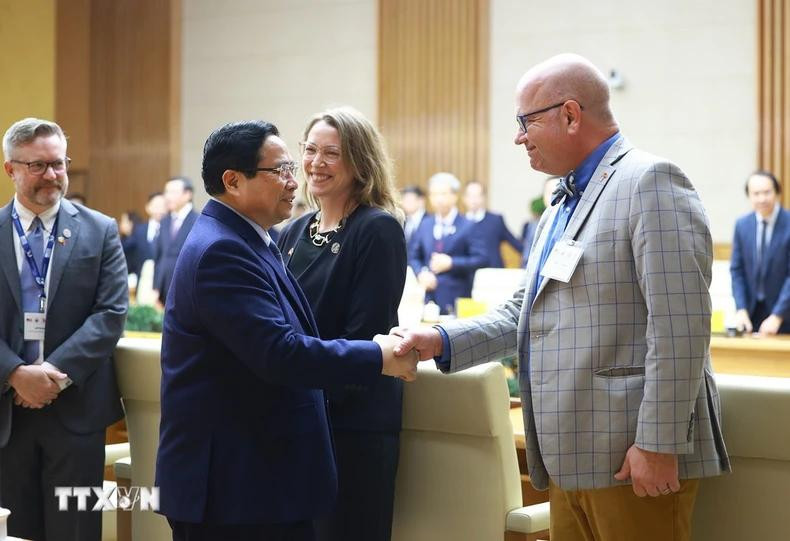 Prime Minister Pham Minh Chinh and leaders of US universities visiting Vietnam to attend IAPP. Prime Minister Pham Minh Chinh and leaders of US universities visiting Vietnam to attend IAPP.