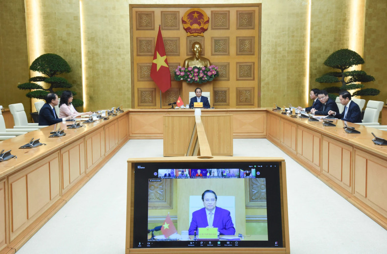 Prime Minister Pham Minh Chinh spoke from the Hanoi location. Prime Minister Pham Minh Chinh spoke from the Hanoi location.