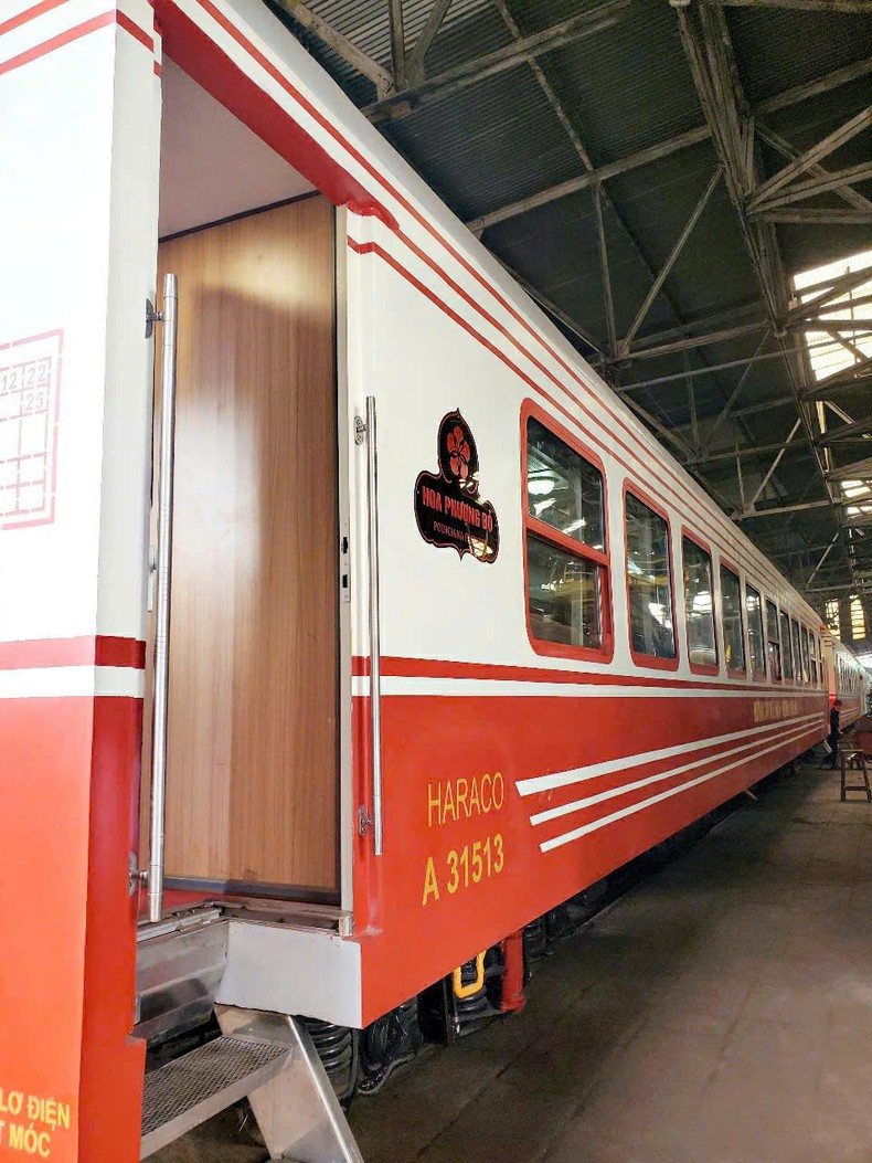 The train is painted in the signature red colour of flamboyant flowers