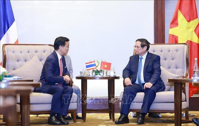 Prime Minister Pham Minh Chinh (R) receives Jormsup Lochaya, Chairman of Super Energy Group. (Photo: VNA) Prime Minister Pham Minh Chinh (R) receives Jormsup Lochaya, Chairman of Super Energy Group. (Photo: VNA)