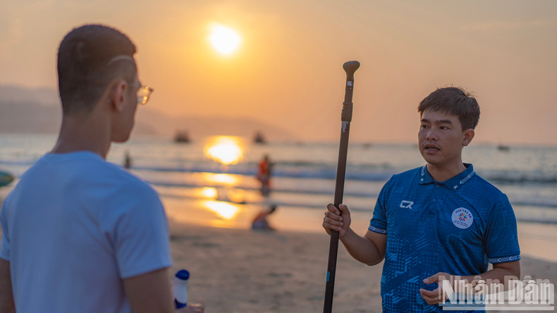 Tourists receive safety instructions before heading out to sea. Tourists receive safety instructions before heading out to sea.