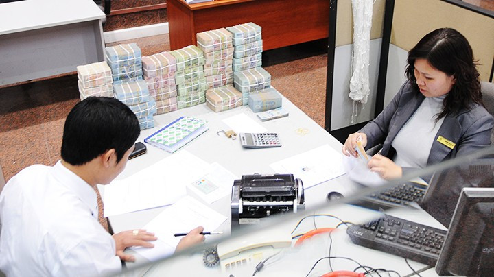 Businesses find it difficult to access bank loans. Photo: NGUYET ANH Businesses find it difficult to access bank loans. Photo: NGUYET ANH