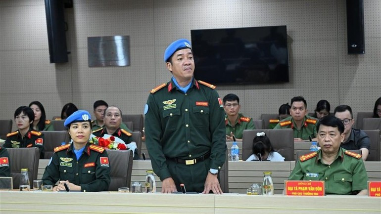 Lieutenant Colonel Nguyen Quyen Chinh speaks on behalf of the Task Force Lieutenant Colonel Nguyen Quyen Chinh speaks on behalf of the Task Force