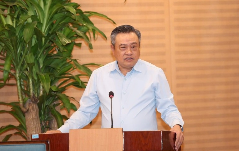 Tran Sy Thanh, Chairman of the Ha Noi Municipal People's Committee, delivers his concluding remarks. Tran Sy Thanh, Chairman of the Ha Noi Municipal People's Committee, delivers his concluding remarks.