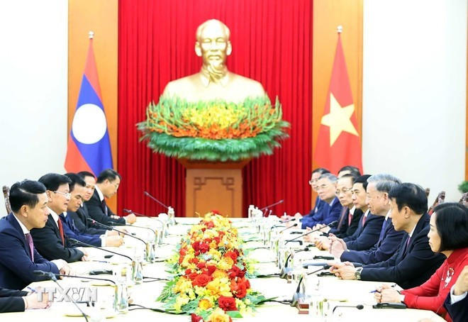 At the meeting between General Secretary of the CPV Central Committee To Lam and Party General Secretary and President of Laos Thongloun Sisoulith. (Photo: VNA)