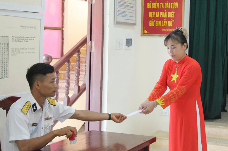 Voters complete the voting process.