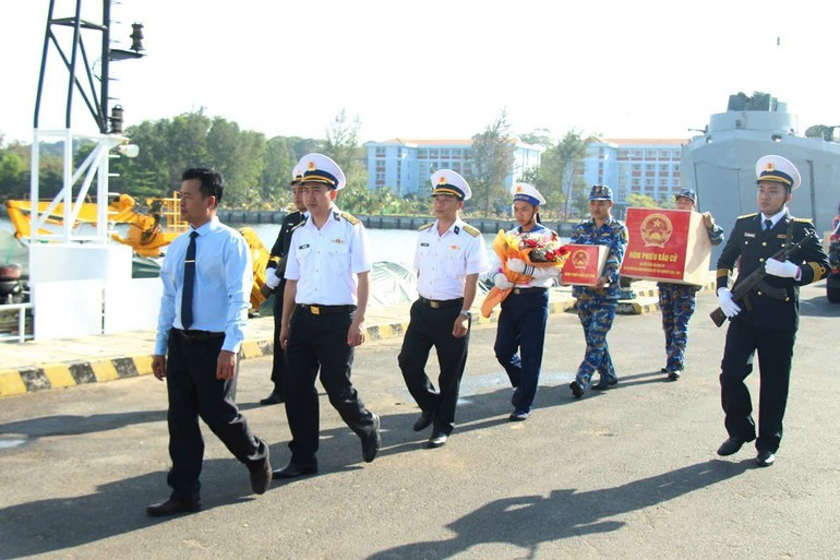 Ballot boxes are carefully loaded onto ships for transport to island polling stations.