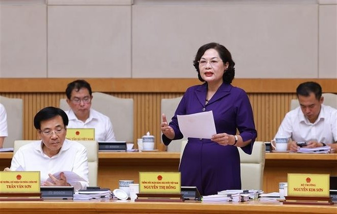 Governor of the State Bank of Vietnam Nguyen Thi Hong speaks at the meeting. (Photo: VNA) Governor of the State Bank of Vietnam Nguyen Thi Hong speaks at the meeting. (Photo: VNA)