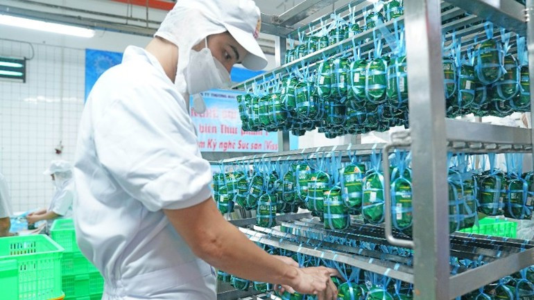 Production of gio lua (Vietnamese pork sausage) at VISSAN, a company actively participating in the “Green Tick Responsibility” programme.