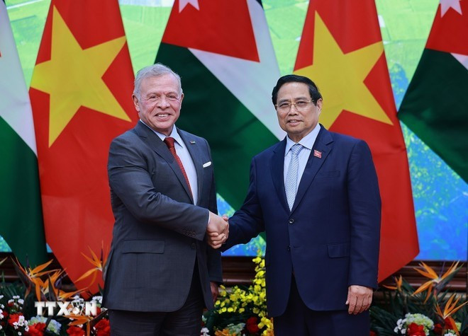 Prime Minister Pham Minh Chinh and King Abdullah II Ibn Al Hussein of Jordan (Photo: VNA)