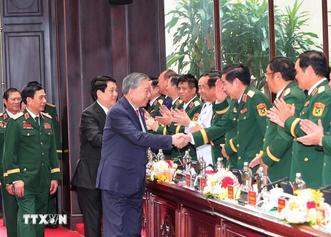 Party General Secretary To Lam and delegates at the closing ceremony of the 12th VPA Party Congress in Ha Noi on October 2, 2025. (Photo: VNA) Party General Secretary To Lam and delegates at the closing ceremony of the 12th VPA Party Congress in Ha Noi on October 2, 2025. (Photo: VNA)