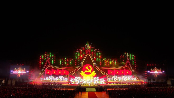 The Lao National Stadium in Vientiane is brilliantly illuminated on January 9 evening as it hosts an unprecedented large-scale art programme celebrating the special friendship between Viet Nam and Laos. (Photo: VNA)