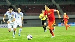 Captain Van Quyet (number 10) shines with a double
