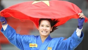 Vovinam artist Nguyen Thi Kim Hoang clinches gold in the women's 55kg combat 