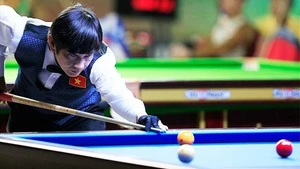 Vietnam’s Dang Dinh Tien finished spectacularly in the men's one-cushion carom discipline