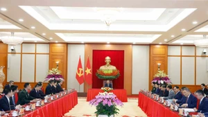 Party General Secretary To Lam hosts a reception for China's Minister of Foreign Affairs Wang Yi, Minister of National Defence Dong Jun, and Minister of Public Security Wang Xiaohong in Ha Noi on March 16. (Photo: VNA)