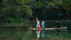 Traditional Vietnamese costumes presented by Hoa Lu Legacy on the Ngo Dong River, Ninh Binh.