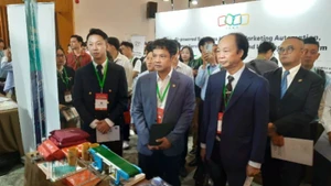 Delegates visit technology booths at Biztech 2025.