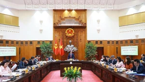 At the third meeting of the National Steering Committee for Financial Inclusion (Photo: VNA)