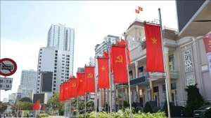 Flags and banners are lavishly displayed in front of the Khanh Hoa provincial People’s Committee headquarters. (Photo: VNA)