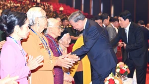 Party General Secretary To Lam and other Party and State leaders extend their regards to Heroic Vietnamese Mothers, national contributors, and exemplary historical witnesses at the programme.