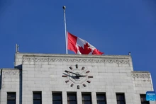 The Canadian national flag flies at half-mast over Vancouver City Hall in Vancouver, British Columbia, Canada, Feb. 11, 2026. Canadian Prime Minister Mark Carney on Wednesday ordered all flags on Parliament Hill and federal buildings across Canada to be flown at half-mast for seven days as the country mourns the victims of a mass shooting in Tumbler Ridge, British Columbia province. The shooting claimed 10 lives, including the shooter, making it one of the deadliest mass shootings in Canadian history. (Photo: Xinhua)