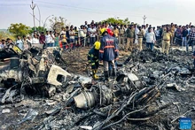 Rescuers are in operation at the site of an air crash at Baramati airport in Pune district, Maharashtra state of India, Jan. 28, 2026. Five people, including the deputy chief minister of India's western state of Maharashtra, Ajit Pawar, and two pilots, on board an aircraft were killed Wednesday in a crash, officials said.