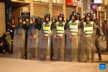 Security forces stand guard at a crossroad during a demonstration demanding for better public services in downtown Rabat, Morocco, Oct. 2, 2025. Three people were killed during youth-led protests near Morocco's Atlantic coastal city of Agadir, the Moroccan Interior Ministry said Thursday. Despite the government's pledges, protests that began across Morocco on Saturday have continued. (Photo: Xinhua) 