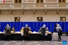 Voters collect ballot papers at the City Hall in Copenhagen, Denmark, on March 24, 2026. Denmark's ruling Social Democrats remained the largest party in Tuesday's parliamentary election, according to preliminary official results based on vote counts in metropolitan Denmark, while counting in Greenland and the Faroe Islands is still ongoing. (Photo: Xinhua)