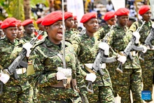 Ugandan female military officers march at an all-women military parade to mark International Women's Day, in Kampala, Uganda, on March 8, 2026. Uganda on Sunday held an all-women military parade to mark International Women's Day, observed this year under the national theme "Scaling up investment to accelerate access to justice for women and girls across Uganda." (Uganda Vice President Press Unit/Handout via Xinhua)