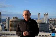 Israeli Prime Minister Benjamin Netanyahu speaks at the Kirya military headquarters in Tel Aviv, Israel, March 1, 2026. Israeli Prime Minister Benjamin Netanyahu said Sunday that the Israeli air force is striking Tehran with "increasing intensity" and that operations will "intensify further in the coming days." (GPO/Handout via Xinhua)