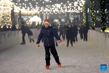 People skate at the Ala-Too Square during a New Year event in Bishkek, Kyrgyzstan, Dec. 23, 2025. (Photo: Xinhua)