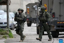 Photo taken on Feb. 26, 2026 shows Israeli soldiers during a military operation in the city of Nablus, in the West Bank. (Photo: Xinhua)