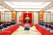 Party General Secretary To Lam hosts a reception for China's Minister of Foreign Affairs Wang Yi, Minister of National Defence Dong Jun, and Minister of Public Security Wang Xiaohong in Ha Noi on March 16. (Photo: VNA)