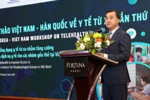 Professor Dr Tran Van Thuan, Deputy Minister of Health, speaks at the conference.