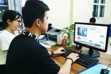 Units are urgently digitising documents. (Photo: Nhan Dan Newspaper)