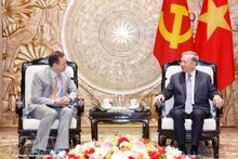 General Secretary of the Communist Party of Viet Nam Central Committee To Lam (right) receives Scott Strazik, President and CEO of GE Vernova, in Ha Noi on March 9, 2026. (Photo: VNA)