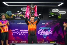 Duong Quoc Hoang poses with the 2026 Premier League Pool trophy. (Photo: Matchroom)