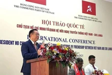 Politburo member and Chairman of the Party Central Committee’s Commission for Information, Education and Mass Mobilisation Nguyen Trong Nghia speaks at the seminar. (Photo: VNA)