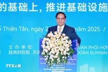 Prime Minister Pham Minh Chinh addresses the Viet Nam-China business forum. (Photo: VNA)