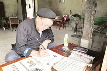Folk artisan Ly Dai Thong has been researching and documenting the customs and practices of the Dao community.
